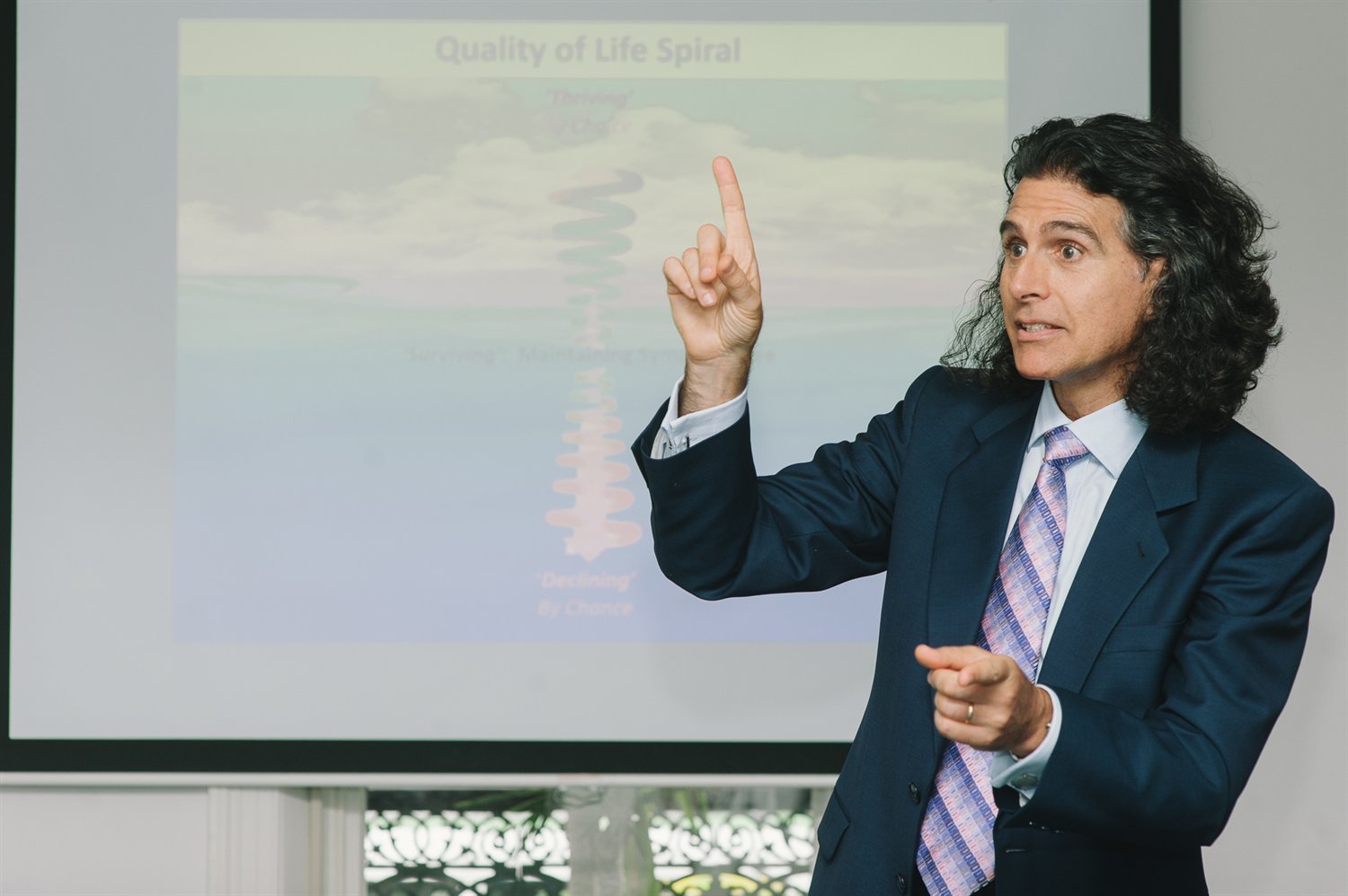 Dr Ari Diskin presenting the Quality of Life Spiral at the Diskin Life Centre in Fitzroy