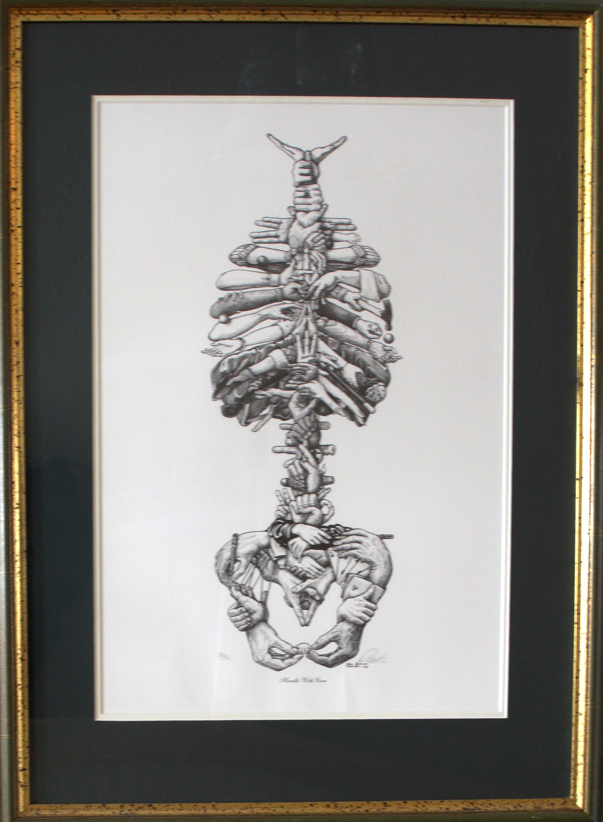 A framed ink drawing of the spine and torso, on the wall at the Diskin Life Centre