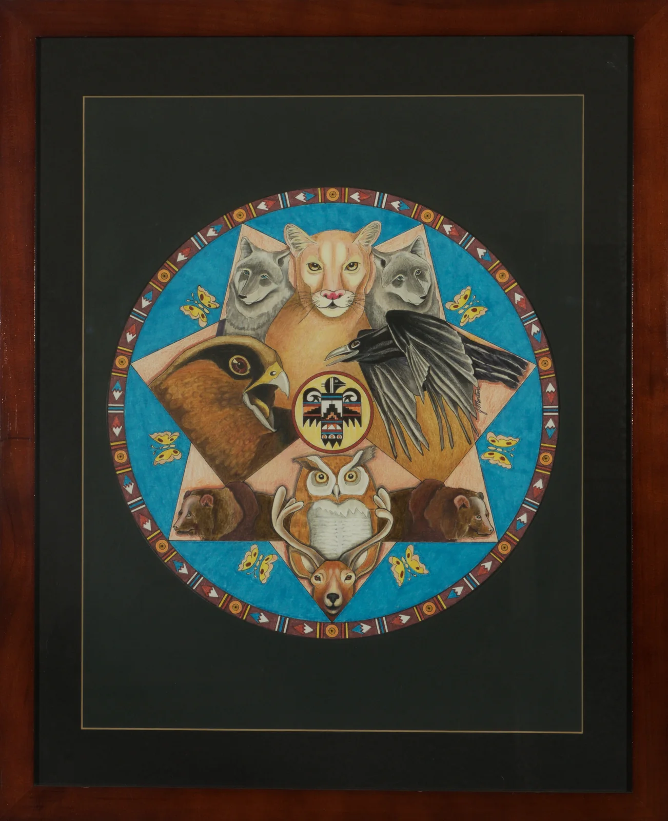 An original hand-painted spirit-animal medallion, cougar, wolves, hawk, raven, owl, bears and deer ringed by a Southwestern border pattern, a one-off work in the Diskin Life collection