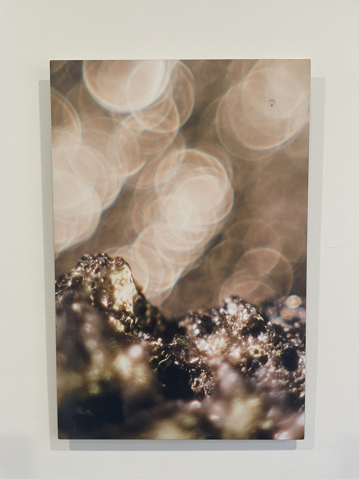 A Keys to Awaken Resonance Art work, warm bokeh light over a crystalline ridge
