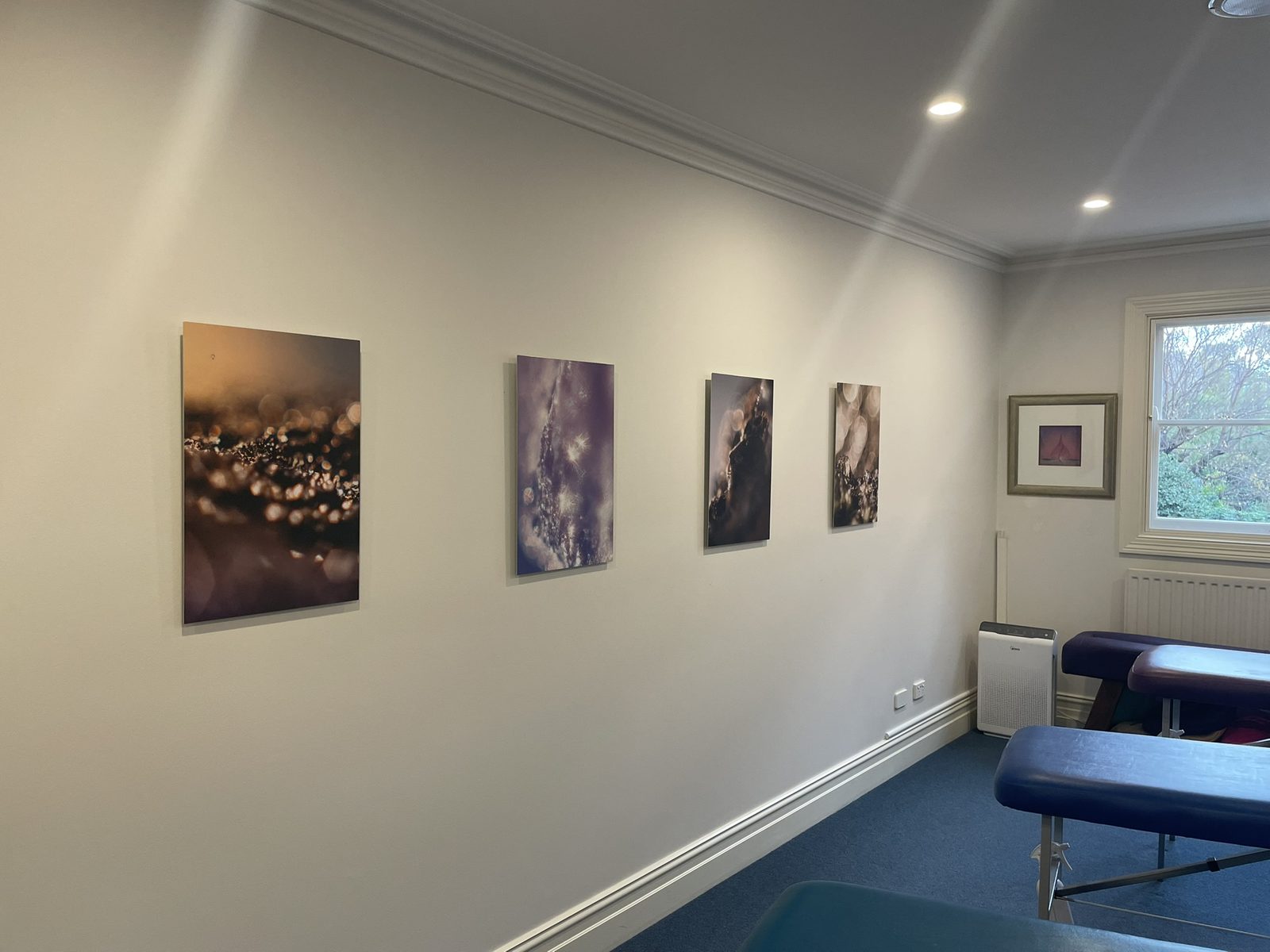 A row of Keys to Awaken works along the wall of the upstairs adjusting zone at the Diskin Life Centre, Fitzroy
