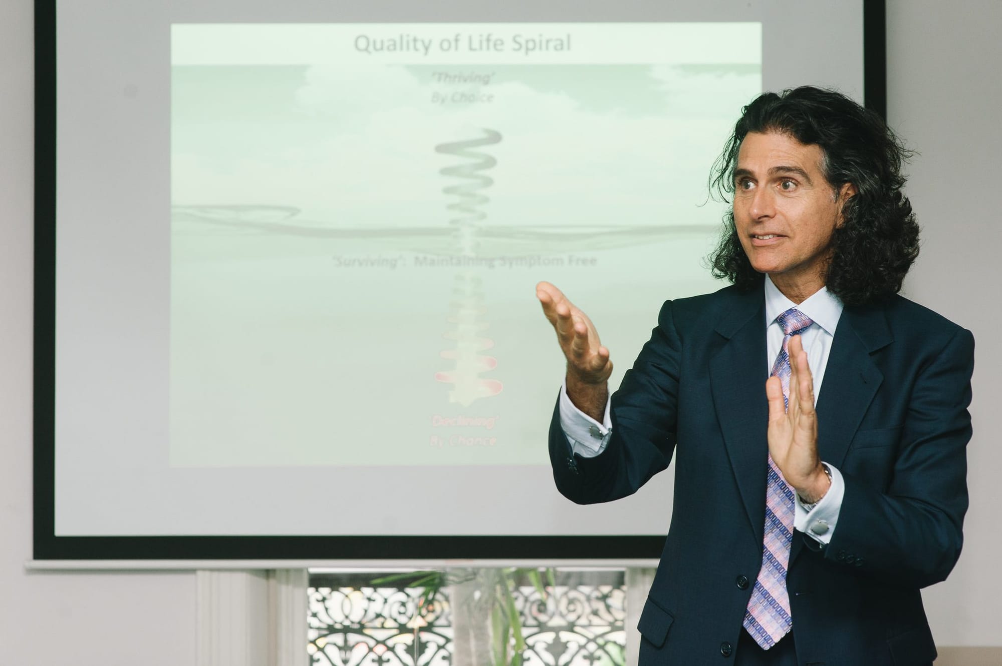 Dr Ari Diskin teaching a Vitality By Design wellness education session to clients at the Diskin Life Centre in Fitzroy, Melbourne, Australia